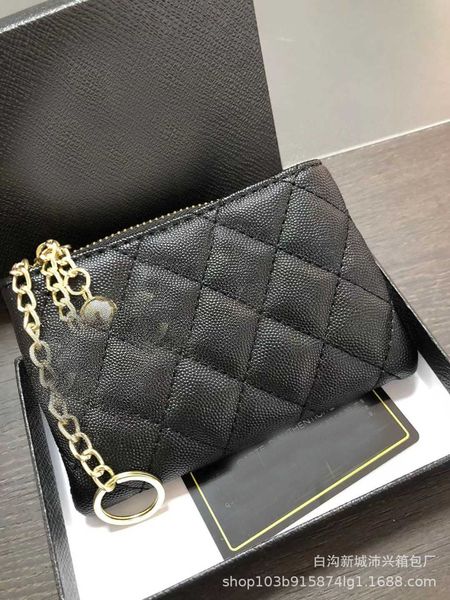 clutch bags 2022 spring and summer new women's xiaoxiang/fenglingge handbag fashion little golden ball change key bag small square bag/
clutch bags 2022 spring and summer new women's xiaoxiang/fenglingge handbag fashion little golden ball change key bag small square bag/