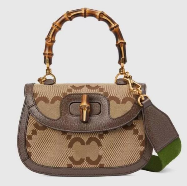 cc camel color mini bamboo bag fashion good-looking handbag ladie practical versatile striped webbing wide shoulder strap designer messenger
cc camel color mini bamboo bag fashion good-looking handbag ladie practical versatile striped webbing wide shoulder strap designer messenger
