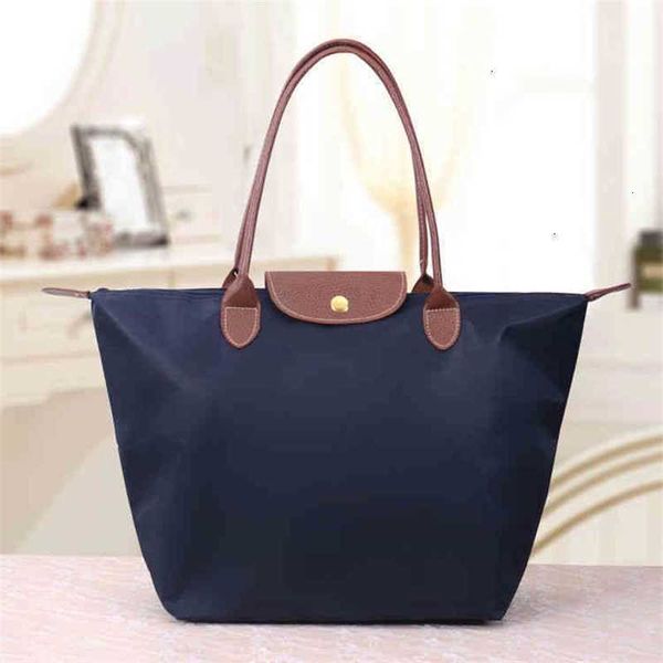 fashion women's handbags a large net red lady's one shoulder portable dumpling folding storage bag customized
fashion women's handbags a large net red lady's one shoulder portable dumpling folding storage bag customized