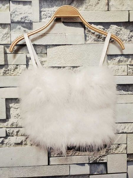 winter style with solid color stitched wool suspender vest female feather bra christmas performance vest, White
winter style with solid color stitched wool suspender vest female feather bra christmas performance vest, White