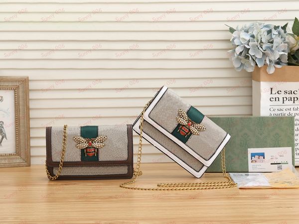 chain single shoulder bag designer pearl animal pattern messenger wallets mobile phone bags luxury lady folding buckle bag
chain single shoulder bag designer pearl animal pattern messenger wallets mobile phone bags luxury lady folding buckle bag
