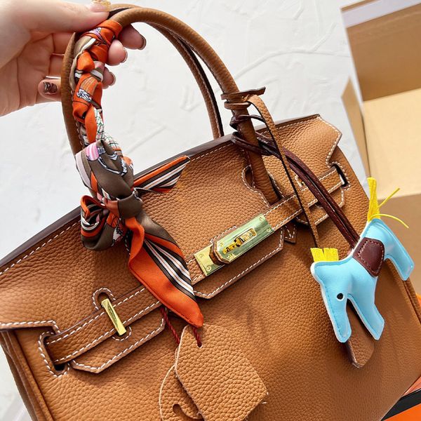 10a quality designer briki tote bag togo leather 25cm 30cm shoulder classic handle fashion gold silver hardware ladies crossbody bby kio3
10a quality designer briki tote bag togo leather 25cm 30cm shoulder classic handle fashion gold silver hardware ladies crossbody bby kio3