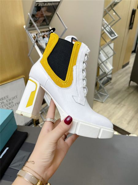 designer womens milano brushed nylon monolith wiite yellow black patent lug sole platform booties leather ankle boots with original box
designer womens milano brushed nylon monolith wiite yellow black patent lug sole platform booties leather ankle boots with original box