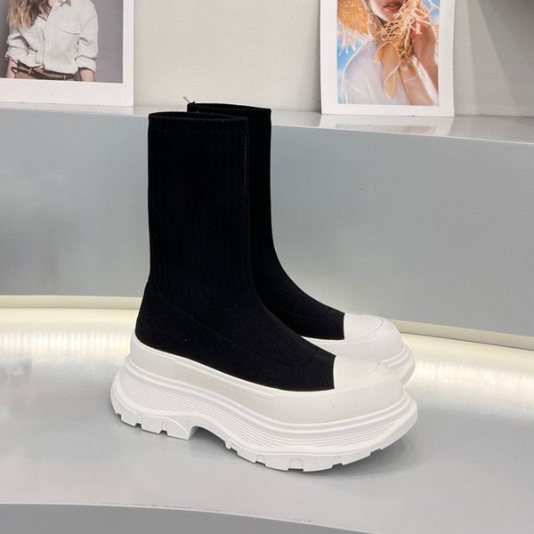 women tread boot in black white canvas platform boots oversized speed trainers round toe sock booties oversize rubber tread sole
women tread boot in black white canvas platform boots oversized speed trainers round toe sock booties oversize rubber tread sole