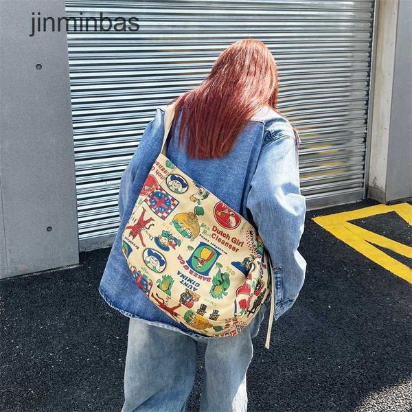 2023 new hand bag factory 80% wholesale and retail fashion american graffiti print canvas girl's large capacity crossbody student stree
2023 new hand bag factory 80% wholesale and retail fashion american graffiti print canvas girl's large capacity crossbody student stree