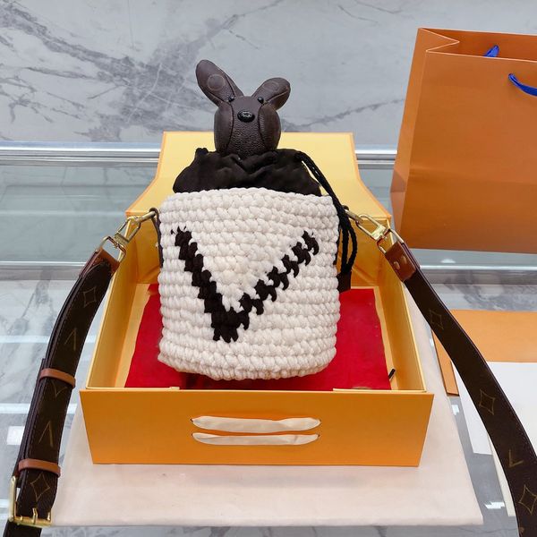 designer rabbit bucket wool woven bags with classic printed leather shoulder strap metal hardware french luxury womens large capacity handba
designer rabbit bucket wool woven bags with classic printed leather shoulder strap metal hardware french luxury womens large capacity handba
