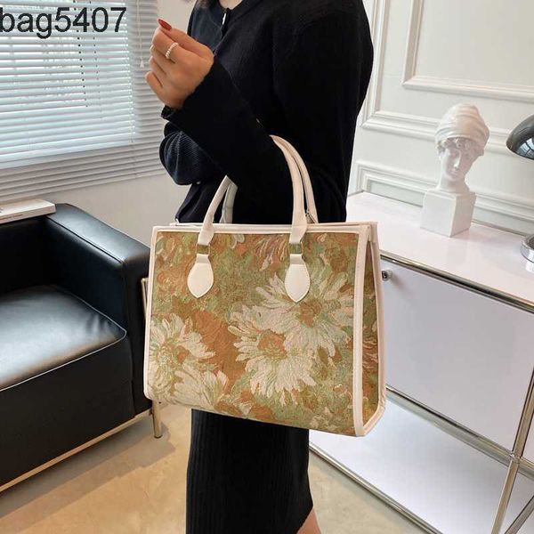 factory 50% fashion bags wholesale and retail new graffiti flower canvas same tote bag women's one shoulder chain handbag
factory 50% fashion bags wholesale and retail new graffiti flower canvas same tote bag women's one shoulder chain handbag