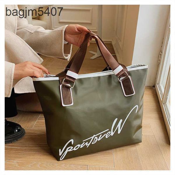 2023 new hand bag factory 80% wholesale and retail one shoulder women's tote printed men's simple shopping
2023 new hand bag factory 80% wholesale and retail one shoulder women's tote printed men's simple shopping
