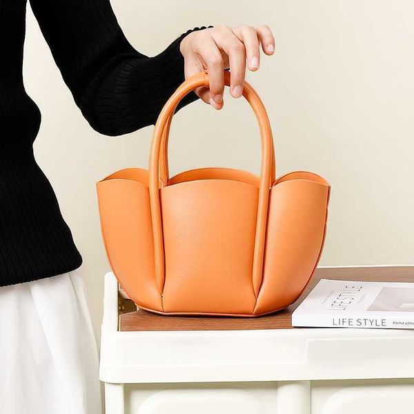 2022 new niche design petal handle mother and child cross body womenbag fashionable simple versatile handbag
2022 new niche design petal handle mother and child cross body womenbag fashionable simple versatile handbag