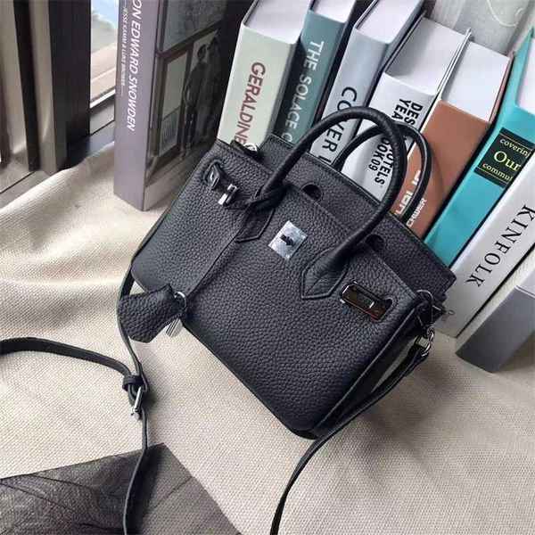 designer bags birkin herme handbags simple and versatilepair with lychee bag handbag with 20 inch silver button head layer cowhide shoulder
designer bags birkin herme handbags simple and versatilepair with lychee bag handbag with 20 inch silver button head layer cowhide shoulder