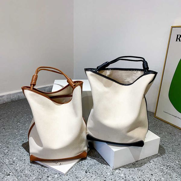 tote stuff sacks autumn and winter bag women's shoulder large capacity simple canvas cylinder niche design splicing bucket 221219
tote stuff sacks autumn and winter bag women's shoulder large capacity simple canvas cylinder niche design splicing bucket 221219