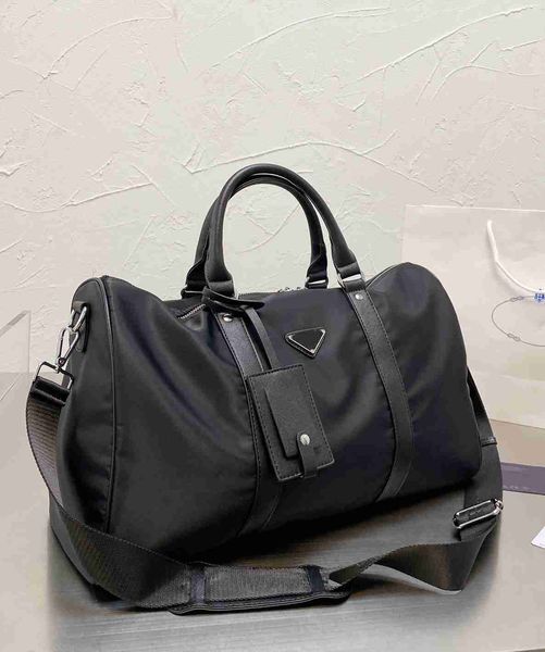 large capacity men fashion duffle bag triple black nylon travel bags mens handle luggage gentleman business tote with shoulder strap
large capacity men fashion duffle bag triple black nylon travel bags mens handle luggage gentleman business tote with shoulder strap