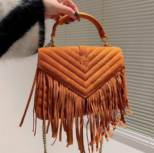classic letter suede tassel chain shoulder bags faux suede wear leather strap cross body bag handle bronze metal hardware handbags
classic letter suede tassel chain shoulder bags faux suede wear leather strap cross body bag handle bronze metal hardware handbags
