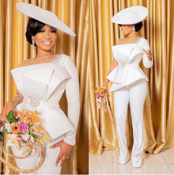 bohemian white jumpsuit wedding dress 2023 with pearls o neck long sleeve satin boho beach bridal dresses with big bow african black girls w
bohemian white jumpsuit wedding dress 2023 with pearls o neck long sleeve satin boho beach bridal dresses with big bow african black girls w