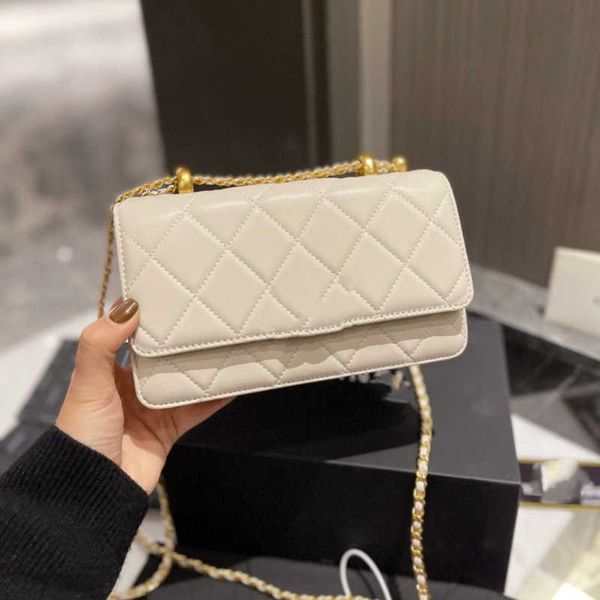 xiangjia 2022 new leisure woc sheepskin fortune bag small gold ball leather diamond chain bag small square bag women's
xiangjia 2022 new leisure woc sheepskin fortune bag small gold ball leather diamond chain bag small square bag women's