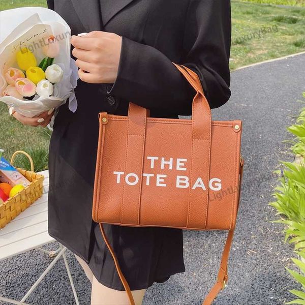 designer marc tote form womens fashion shoulder bag high capacity crossbody bag real leather classic luxury handbags tote female purses 2212
designer marc tote form womens fashion shoulder bag high capacity crossbody bag real leather classic luxury handbags tote female purses 2212