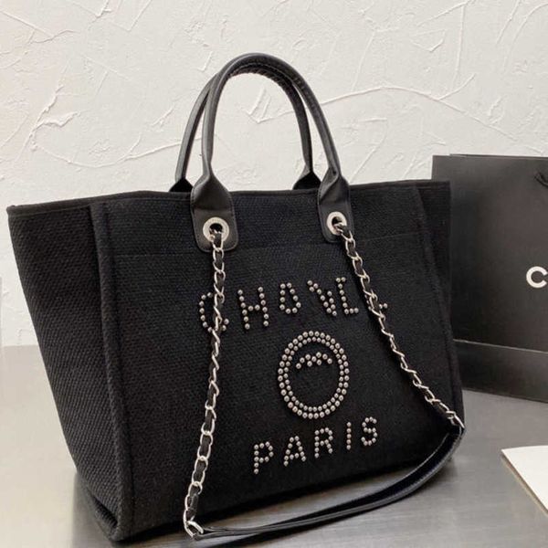 classic luxury women's evening bags ch brand canvas handbag fashion pearl beach hand bag designer female large backpack small packs por
classic luxury women's evening bags ch brand canvas handbag fashion pearl beach hand bag designer female large backpack small packs por