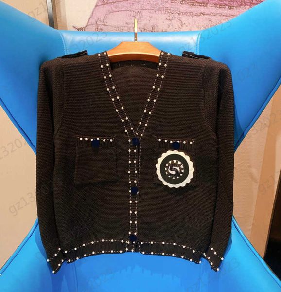 womens sweaters beaded sunflower v-neck long sleeve knitted cardigan shoulder buckle pocket design fashion joker knitwear designer women clo, White;black
womens sweaters beaded sunflower v-neck long sleeve knitted cardigan shoulder buckle pocket design fashion joker knitwear designer women clo, White;black