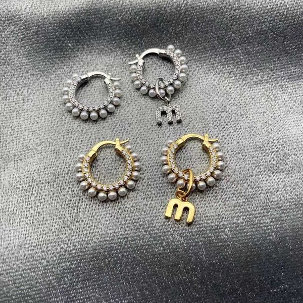 designer miao's woman rings pearl inlaid classic letter earrings light fairy, Golden
designer miao's woman rings pearl inlaid classic letter earrings light fairy, Golden