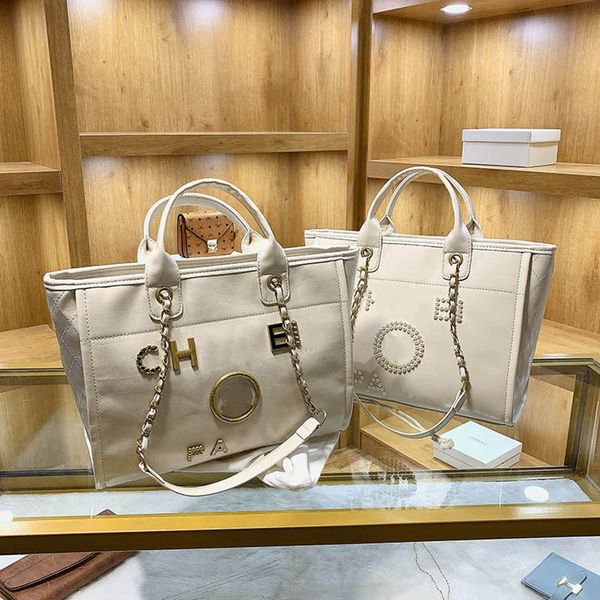 bags totes handbag designer bag women classic imitation luxury brand patent leather large capacity pearl shoulder bag fashion style party di
bags totes handbag designer bag women classic imitation luxury brand patent leather large capacity pearl shoulder bag fashion style party di