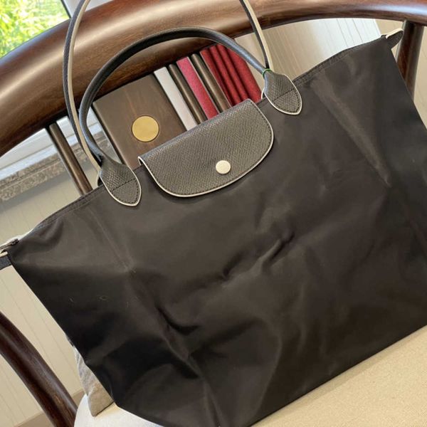 the tote bag women nylon designers s fashion all-match classic womens street trend large capacity hands1228
the tote bag women nylon designers s fashion all-match classic womens street trend large capacity hands1228