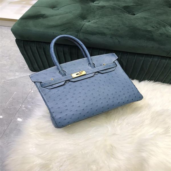 ostrich bag luxury purse size 25cm 8colors to chosen fully handmade wax line stitiching more other brand products pls check out228y
ostrich bag luxury purse size 25cm 8colors to chosen fully handmade wax line stitiching more other brand products pls check out228y