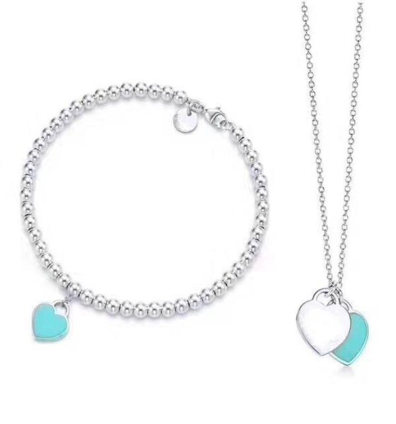2019 women silver thin beads blue silver heart plate stainless steel pendant necklaces and bracelet suit with box and7621156
2019 women silver thin beads blue silver heart plate stainless steel pendant necklaces and bracelet suit with box and7621156