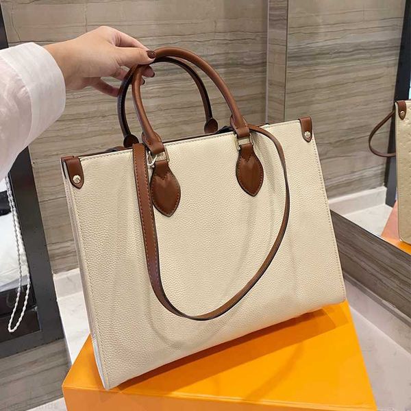 2023 fashion one-shoulder tote bag famous design classic women's pure color print pattern handbag classic pattern top
2023 fashion one-shoulder tote bag famous design classic women's pure color print pattern handbag classic pattern top