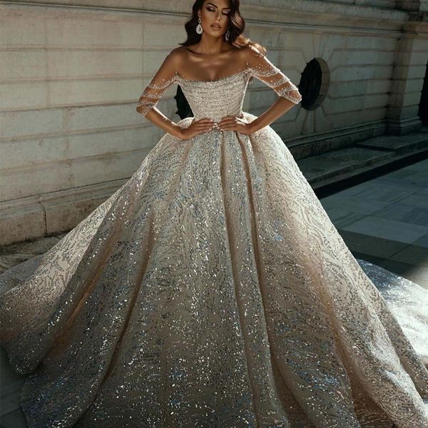 elegant sparkly dubai ball gown wedding dress illusion off shoulder long sleeve sequined saudi arabic bridal gowns, White
elegant sparkly dubai ball gown wedding dress illusion off shoulder long sleeve sequined saudi arabic bridal gowns, White