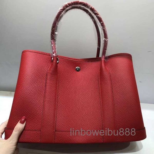designer herme bag garden party bags womens crossbody luxury tote handbags layer litchi grain cowhide leather shoulder strap 25 30 36cm
designer herme bag garden party bags womens crossbody luxury tote handbags layer litchi grain cowhide leather shoulder strap 25 30 36cm
