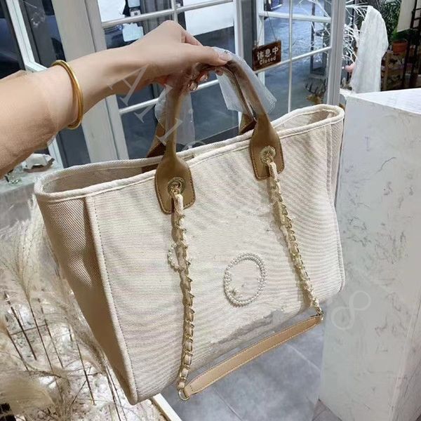 2022 summer classic c brand totes beach bags cavan deauville chain handle large capacity pochette 2 color beige women's two-tone
2022 summer classic c brand totes beach bags cavan deauville chain handle large capacity pochette 2 color beige women's two-tone
