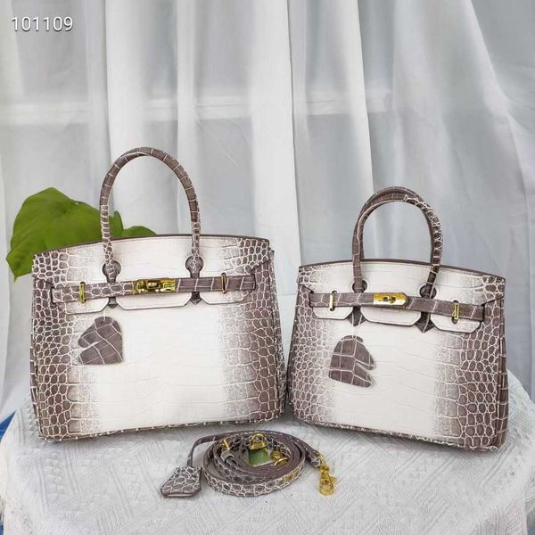original designer yili leather factory fashion portable tote texture foreign style lock single shoulder messenger large capacity women
original designer yili leather factory fashion portable tote texture foreign style lock single shoulder messenger large capacity women