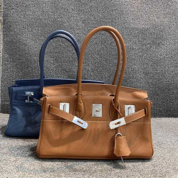 fashion bag birkins leather herme handbags shockless leather women in shopping mall layer togo cowhide hand held armpit lock
fashion bag birkins leather herme handbags shockless leather women in shopping mall layer togo cowhide hand held armpit lock