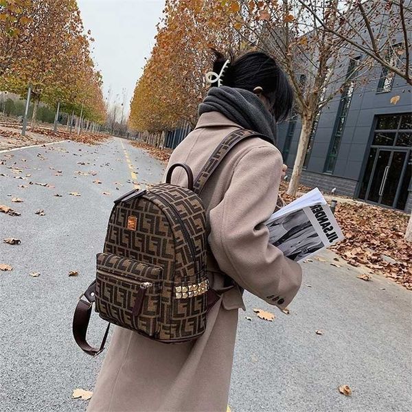 designer women's fashion letter canvas brown rivet backpack large capacity backpack handbags outlet
designer women's fashion letter canvas brown rivet backpack large capacity backpack handbags outlet
