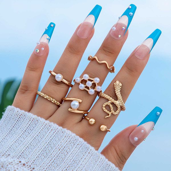 hand decorated alloy pearl inlaid seven piece ring geometric diamond snake ring set, Silver
hand decorated alloy pearl inlaid seven piece ring geometric diamond snake ring set, Silver
