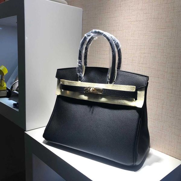 h bag head layer h ermese leather briki fashion classic bag thirty hand in elegant black wax thread togo soft cow female
h bag head layer h ermese leather briki fashion classic bag thirty hand in elegant black wax thread togo soft cow female