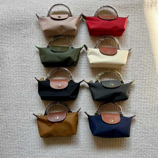 new 2022 designer lungxiang bag mini dumpling single handle large capacity nylon cognac color wallet handbag purse coins bags evening handba 
new 2022 designer lungxiang bag mini dumpling single handle large capacity nylon cognac color wallet handbag purse coins bags evening handba