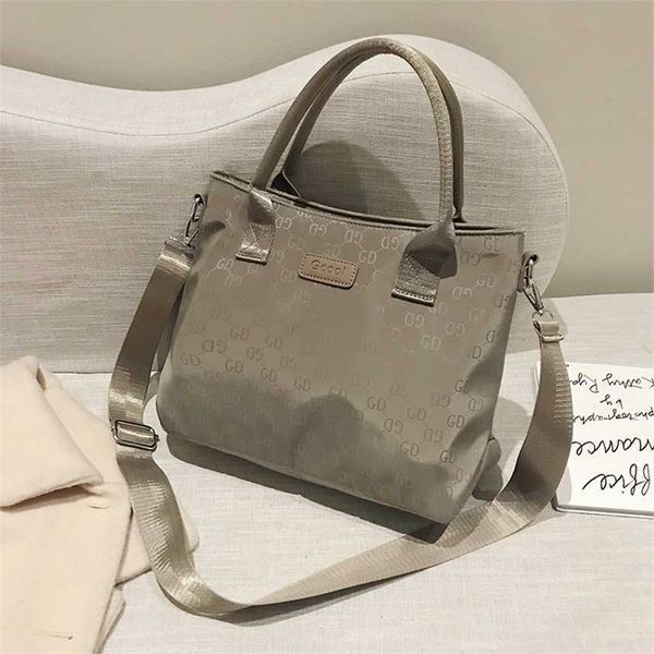 luxury designer new women's bag messenger oxford cloth bag high-end hand fashion versatile sling single shoulder large capacity travel
luxury designer new women's bag messenger oxford cloth bag high-end hand fashion versatile sling single shoulder large capacity travel