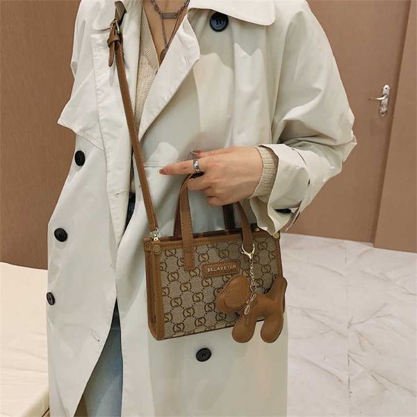 handbag hand women's autumn winter dog pendant printing small square bag fashion sling single shoulder messenger bag
handbag hand women's autumn winter dog pendant printing small square bag fashion sling single shoulder messenger bag