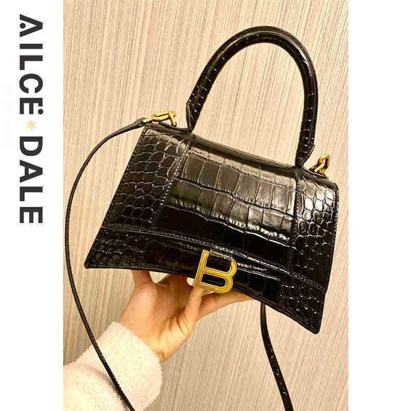 designer balenciga hourglass bag correct women handbag fashion star same b-shaped crocodile pattern leather portable slanting
designer balenciga hourglass bag correct women handbag fashion star same b-shaped crocodile pattern leather portable slanting