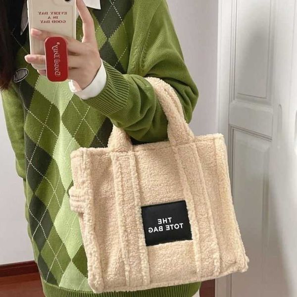 woman's luxury handbag designer marc's jacob tote bag hiatus autumn winter new curly plush large capacity student commuter wide sh
woman's luxury handbag designer marc's jacob tote bag hiatus autumn winter new curly plush large capacity student commuter wide sh