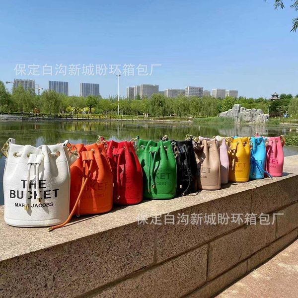 woman's luxury handbag designer marc's jacob tote bag new summer trend letter bucket lady one shoulder messenger fashion style
woman's luxury handbag designer marc's jacob tote bag new summer trend letter bucket lady one shoulder messenger fashion style