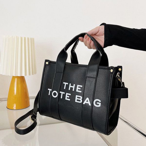 designer bags 2022 new lychee pattern ladies tote shopping bag high-end fashion shoulder messenger bag
designer bags 2022 new lychee pattern ladies tote shopping bag high-end fashion shoulder messenger bag
