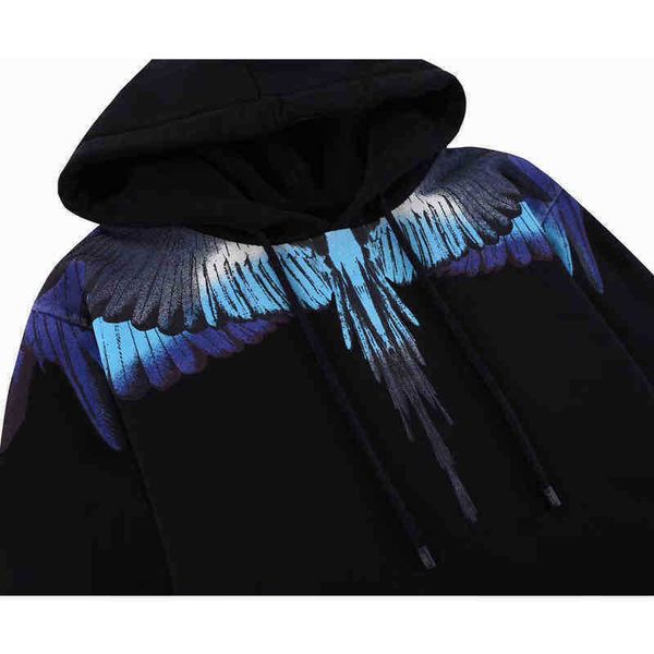 marcelos burlon winter new mb black ice blue wing sweater with hat round neck long sleeve and women loose large lovers fashion men
marcelos burlon winter new mb black ice blue wing sweater with hat round neck long sleeve and women loose large lovers fashion men