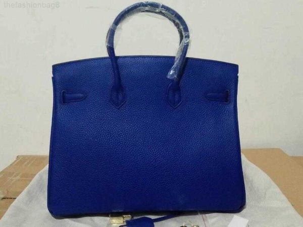 taurillon grainy leather royal blue color totes handbag lock and keys double handles purse
taurillon grainy leather royal blue color totes handbag lock and keys double handles purse
