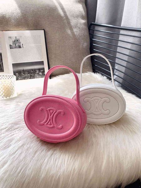 triumphal arch round cake bag women's cross body leather box pink portable moon
triumphal arch round cake bag women's cross body leather box pink portable moon