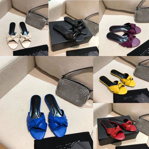 2022 designer women pure color butterfly slides slippers leather outdoor red yellow blue purple black flat heeled sandals shallow mouth slip 
2022 designer women pure color butterfly slides slippers leather outdoor red yellow blue purple black flat heeled sandals shallow mouth slip