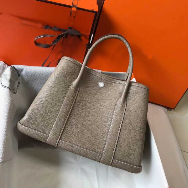 herme garden handbags autumn and winter 2022 new togo head leather large capacity luxury hand tote women wm
herme garden handbags autumn and winter 2022 new togo head leather large capacity luxury hand tote women wm