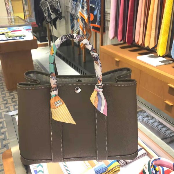 aher max designer fashion head layer leather herme garden bag full canvas splicing garden party 30 36 portable diagonal
aher max designer fashion head layer leather herme garden bag full canvas splicing garden party 30 36 portable diagonal