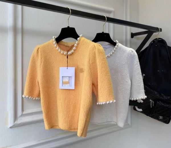 women's sweaters round neck pullover pearl women spring and summer puff sleeves knitted shirt, White;black
women's sweaters round neck pullover pearl women spring and summer puff sleeves knitted shirt, White;black
